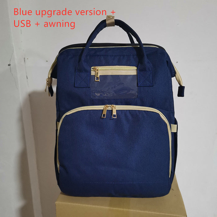 Versión de carga USB Mochila para cama de mamá plegable de gran capacidad multifunción