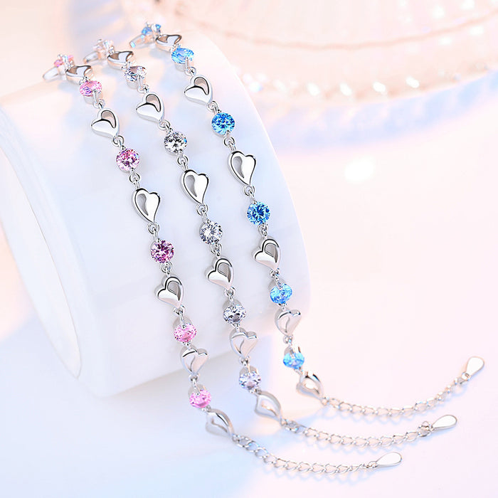 Pulsera chapada en plata con corazón ahuecado para mujer