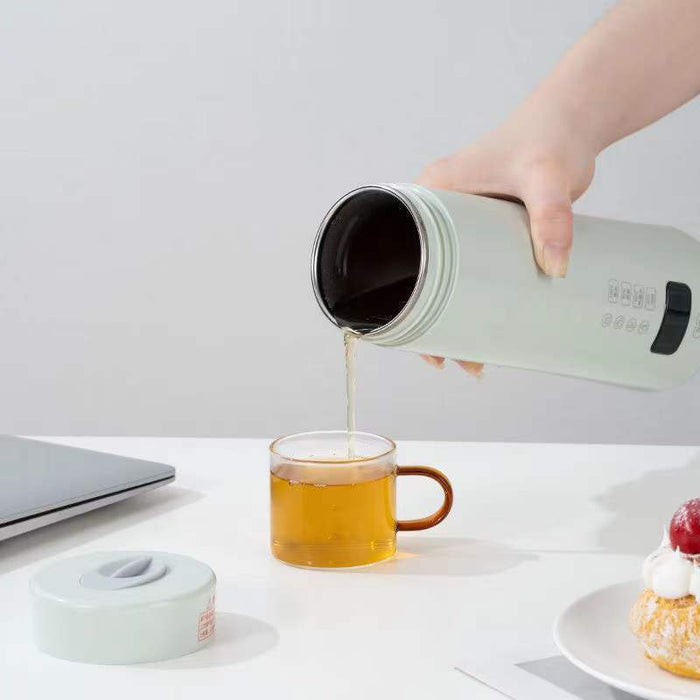 Taza integrada con aislamiento de hervidor eléctrico