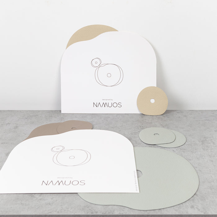 Placemat and coasters made of natural leather, ivory